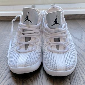 Size 4Y Jordan’s silver and white